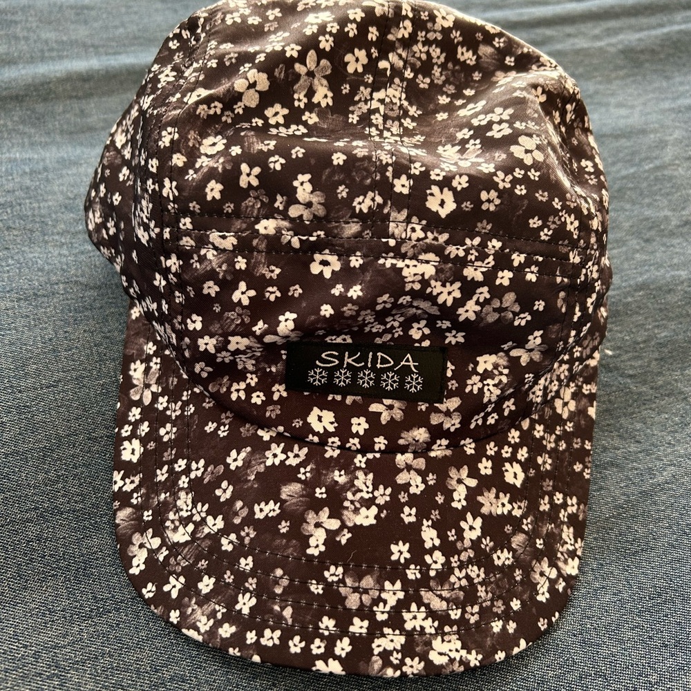 NWOT SKIDA Original Brim Hat. Color: Daisy Jones. Adjustable. Super cute!